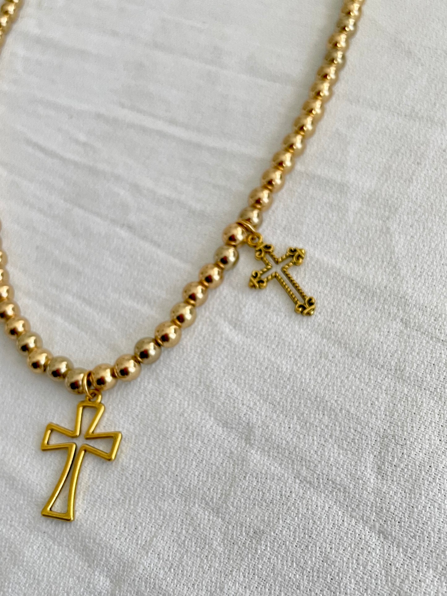 Resurrection cross pearl necklace