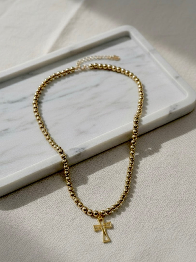 single cross pearl necklace