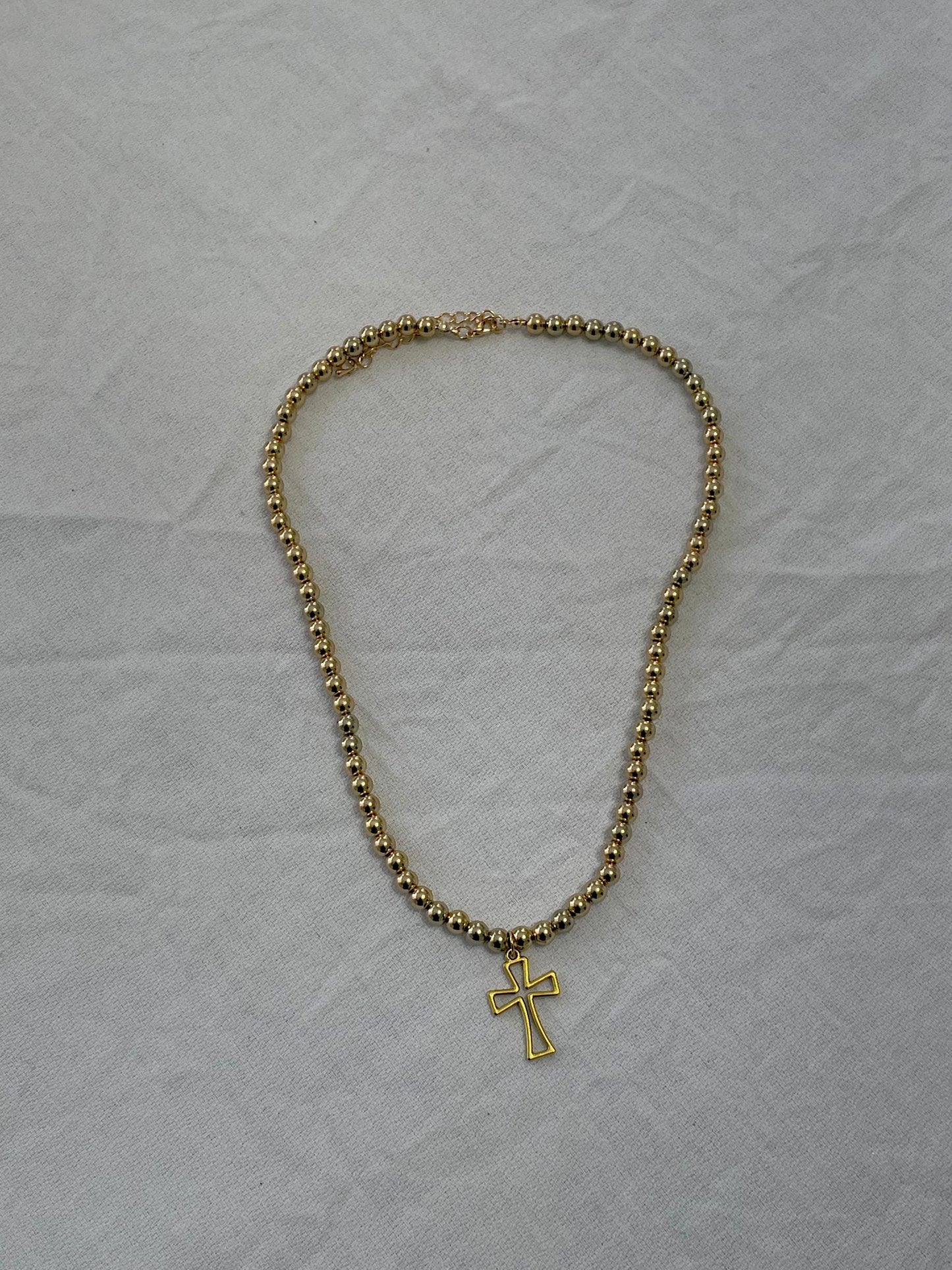 single cross pearl necklace
