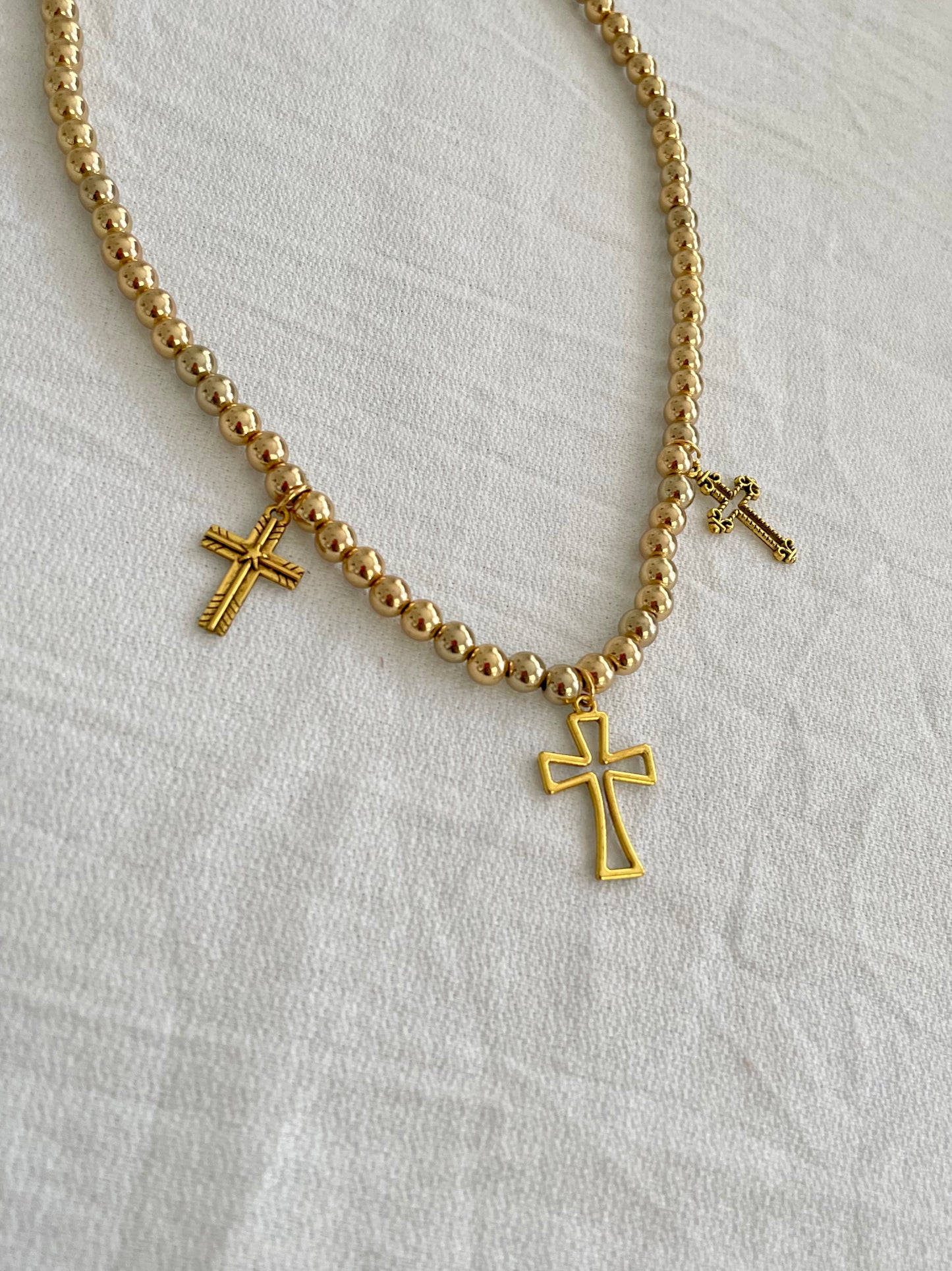 Resurrection cross pearl necklace